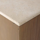 Close up of Four Hands Boa Media Console in Sandy Mindi on a white background at Addison West