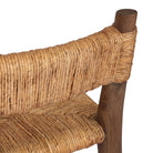 Close up of Four Hands Bovard Dining Chair in Stained Toasted Brown on a white background at Addison West