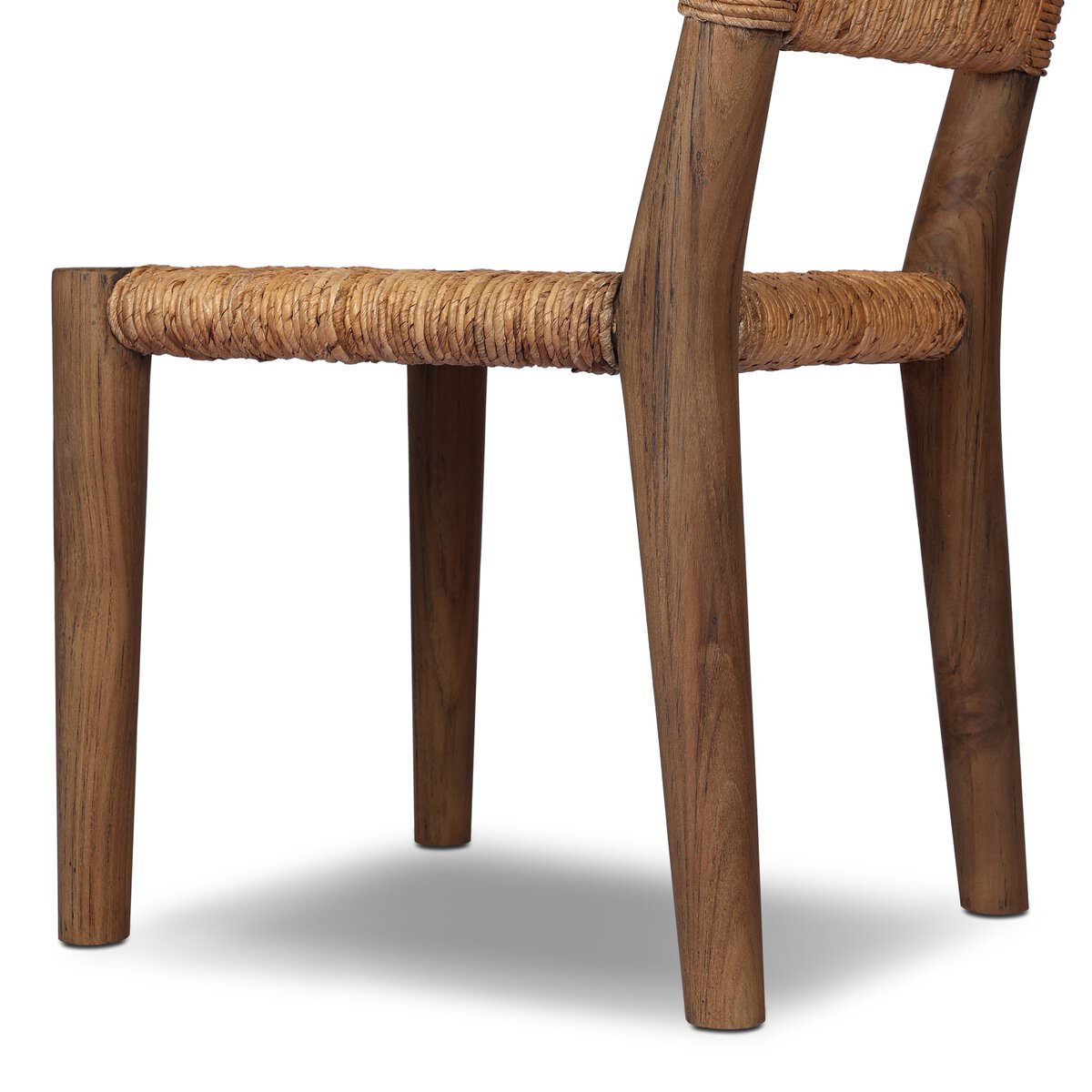 Close up of Four Hands Bovard Dining Chair in Stained Toasted Brown on a white background at Addison West