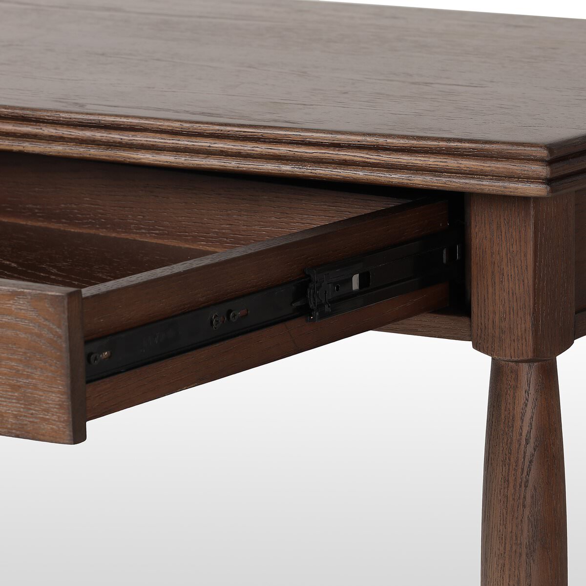 Close up of Four Hands Bowfront Desk in Drifted Oak Veneer on a white background at Addison West