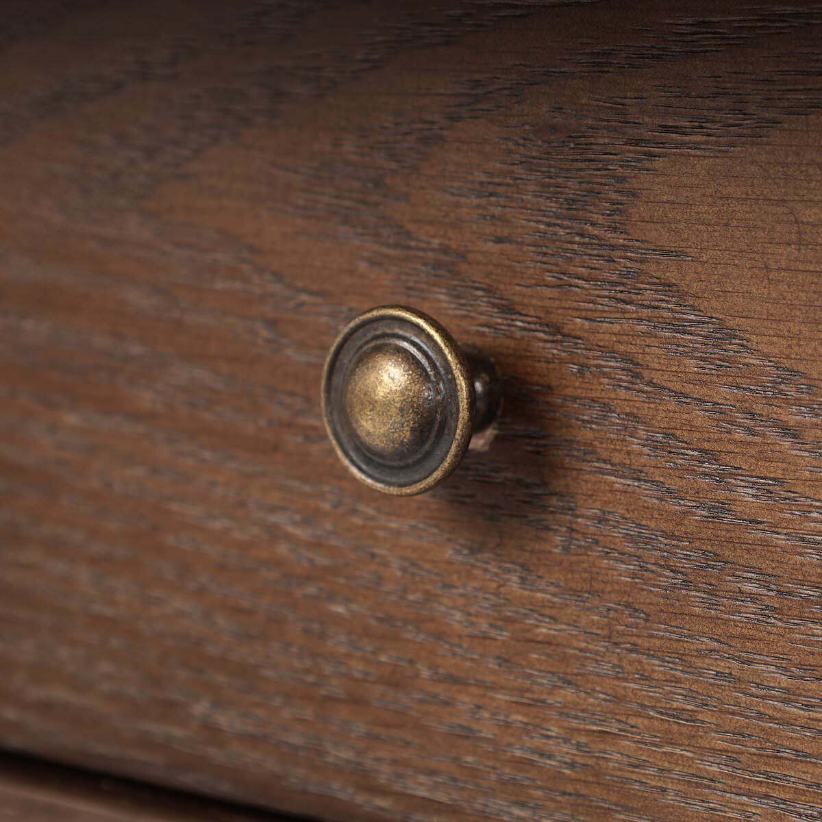Close up of Four Hands Bowfront Desk in Drifted Oak Veneer at Addison West