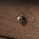 Close up of Four Hands Bowfront Desk in Drifted Oak Veneer at Addison West