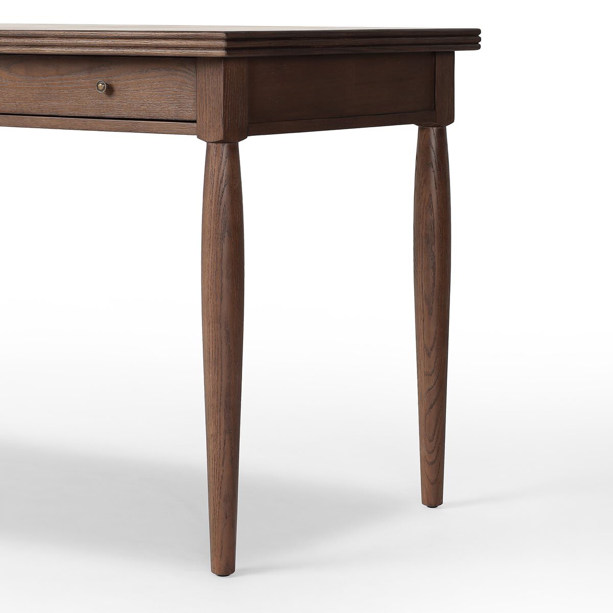Close up of Four Hands Bowfront Desk in Drifted Oak Veneer on a white background at Addison West