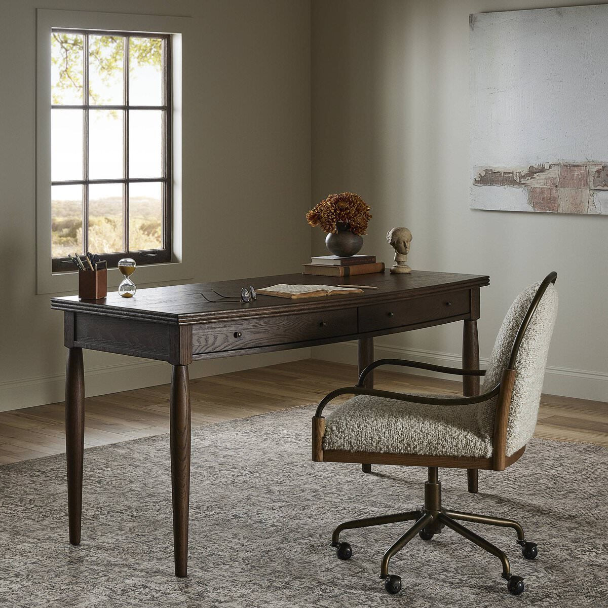 Four Hands Bowfront Desk in Drifted Oak Veneer in an office at Addison West