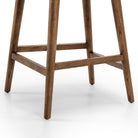 Close up of Four Hands Cardell Swivel Counter Stool in Sonoma Chestnut on a white background at Addison West