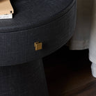 Four Hands Chiro Nightstand in Black Linen in bedroom at Addison West.