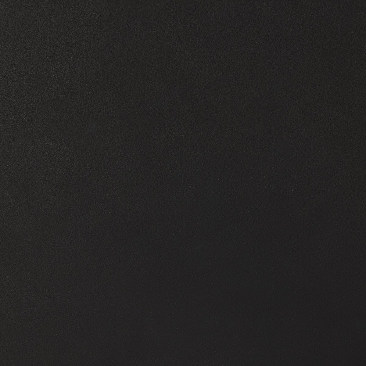 Close up of Four Hands Claude Desk in Distressed Black Oak Veneer at Addison West
