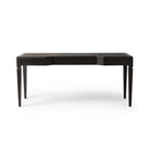 Four Hands Claude Desk in Distressed Black Oak Veneer on a white background at Addison West