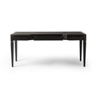 Four Hands Claude Desk in Distressed Black Oak Veneer on a white background at Addison West