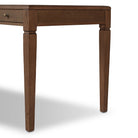Close up of Four Hands Claude Desk in Tan Oak Veneer on a white background at Addison West