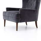 Close up of Four Hands Clermont Chair in Charcoal Worn Velvet on a white background