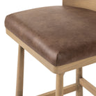 Close up of Four Hands Cloris Swivel Counter Stool in Palermo Cigar on white background at Addison West.