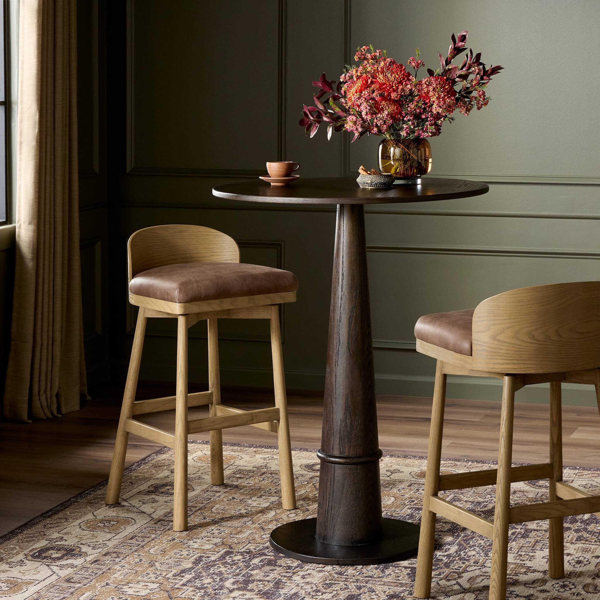 Four Hands Cloris Swivel Counter Stool in Palermo Cigar in dining room at Addison West.