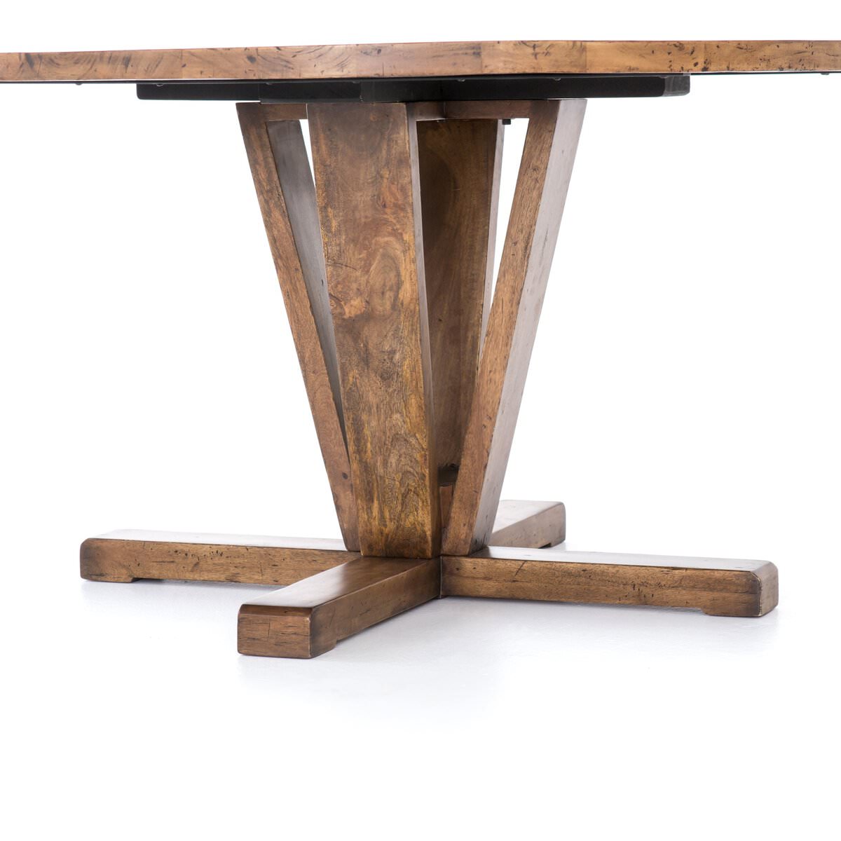 Close up of Four Hands Cobain Round 60" Dining Table in Reclaimed Mango on a white background
