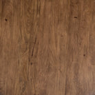 Close up of Four Hands Cobain Round 60" Dining Table in Reclaimed Mango on a white background