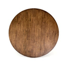 Four Hands Cobain Round 60" Dining Table in Reclaimed Mango on a white background