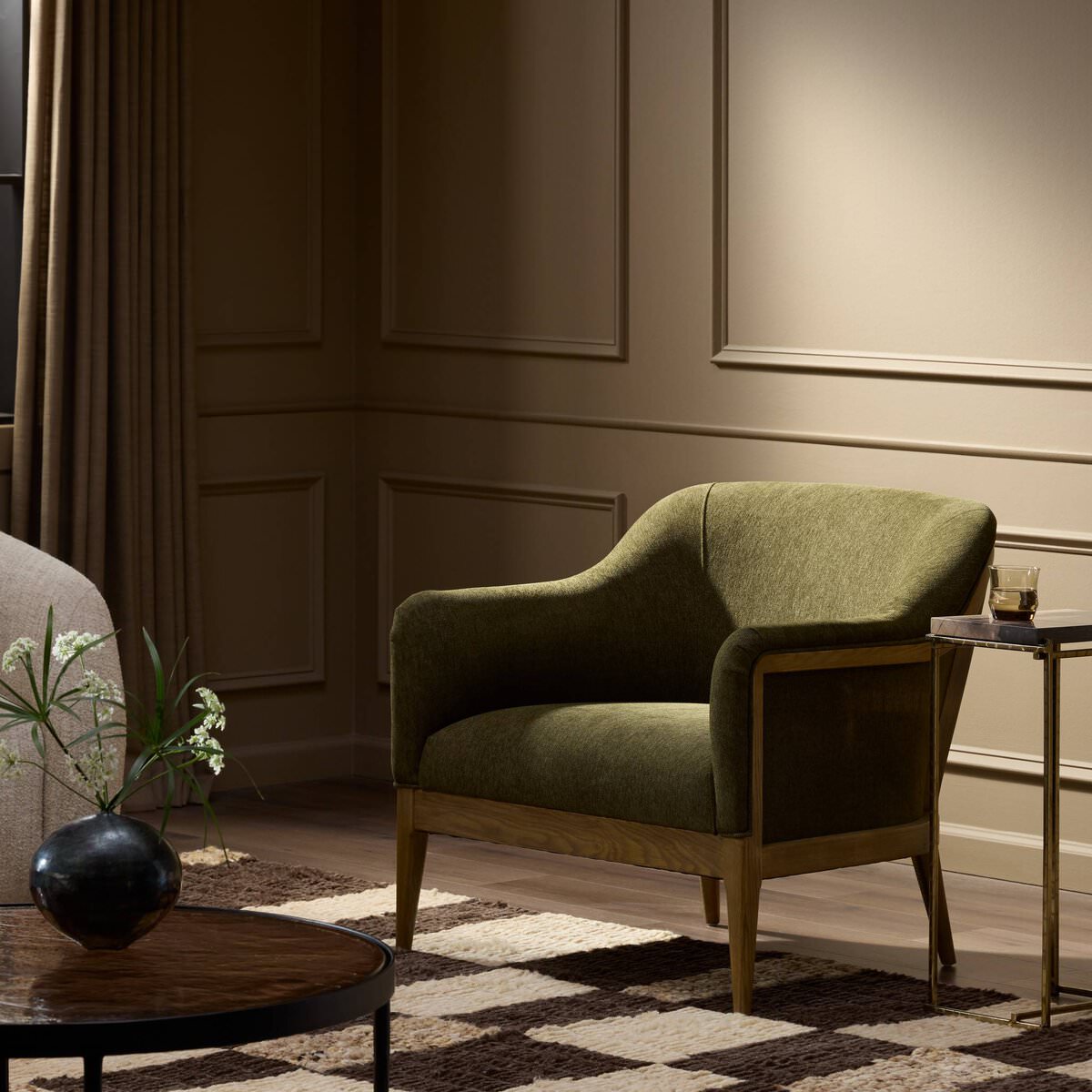 Four Hands Colston Chair in Sutton Olive in a living room at Addison West