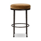 Four Hands Corinne Counter Stool in Surrey Ochre on a white background at Addison West.