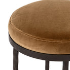 Close up of Four Hands Corinne Counter Stool in Surrey Ochre on a white background at Addison West.
