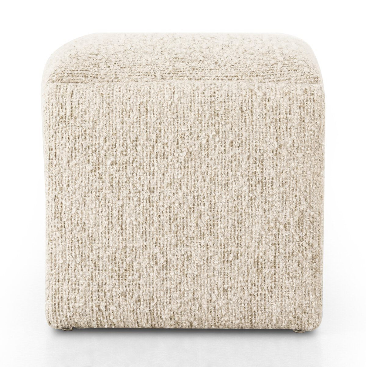 Side of Four Hands Daniel Ottoman in Ivan Sand on a white background at Addison West