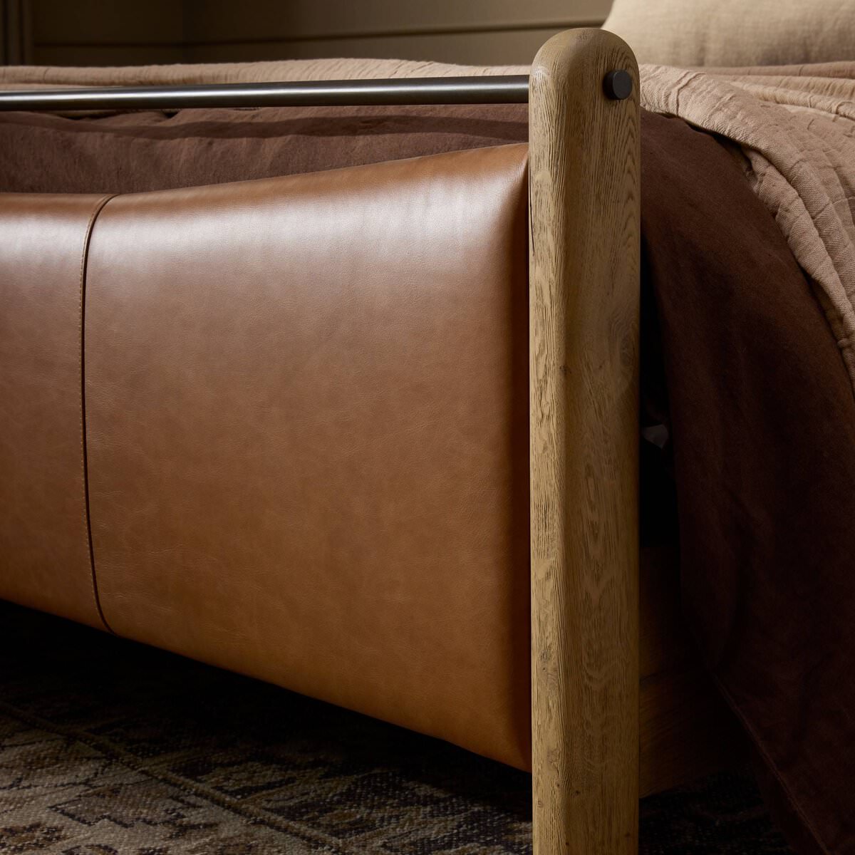 Close up of Four Hands Dina Bed in Sonoma Chestnut, Queen in a bedroom at Addison West