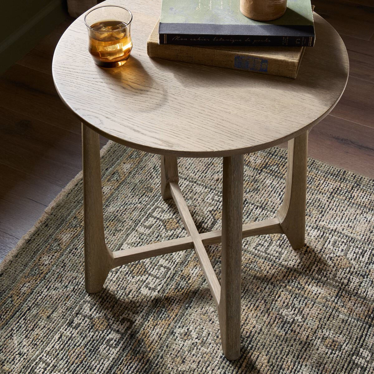 Close up of Four Hands Dupree End Table in Washed Oak in a living room at Addison West