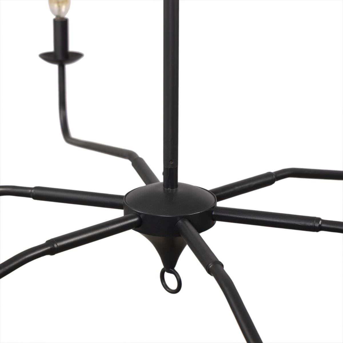 Close up of Four Hands Edlyn Chandelier in Antiqued Iron on a white background