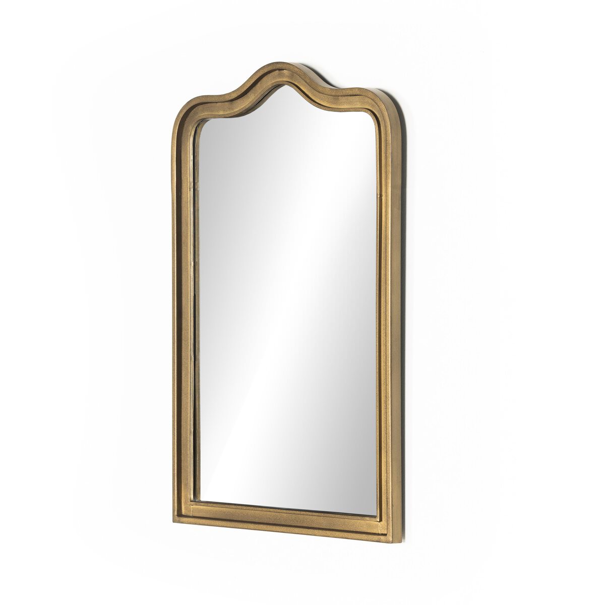 Four Hands Effie Mirror in Raw Antique Brass on a white background at Addison West