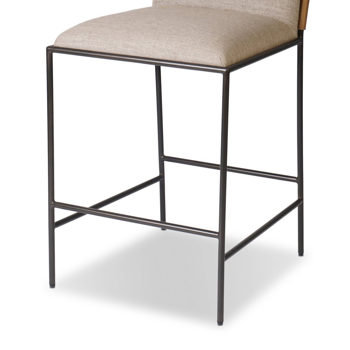 Close up of Four Hands Elba Counter Stool in Alcala Wheat on a white background at Addison West
