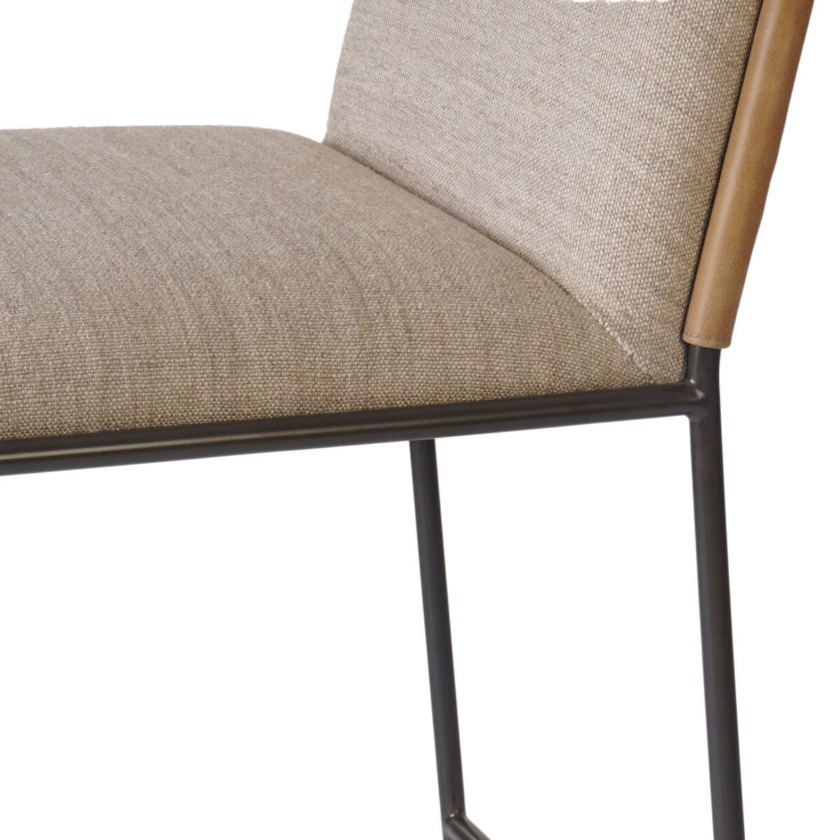 Close up of Four Hands Elba Counter Stool in Alcala Wheat on a white background at Addison West