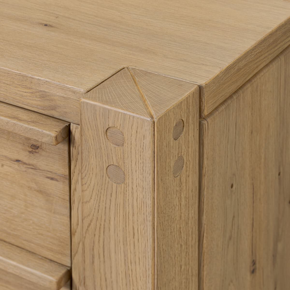 Close up of Four Hands Emmer 6 Drawer Dresser in Aged Smoked Oak Veneer on a white background at Addison West