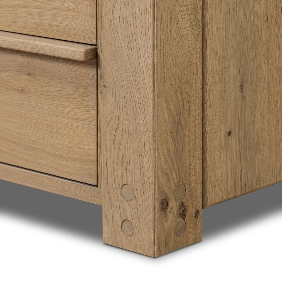 Close up of Four Hands Emmer 6 Drawer Dresser in Aged Smoked Oak Veneer on a white background at Addison West
