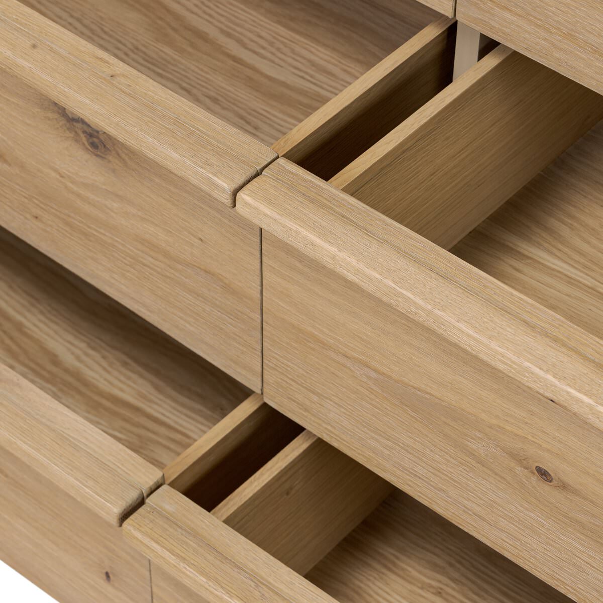 Close up of Four Hands Emmer 6 Drawer Dresser in Aged Smoked Oak Veneer on a white background at Addison West