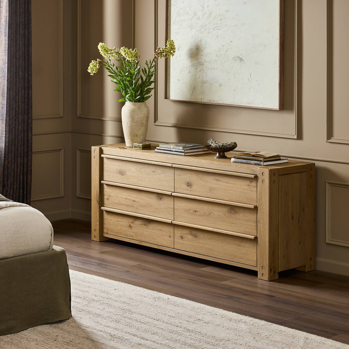 Four Hands Emmer 6 Drawer Dresser in Aged Smoked Oak Veneer in a bedroom at Addison West