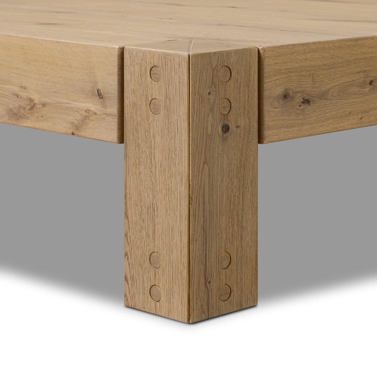 Close up of Four Hands Emmer Coffee Table in Aged Smoked Oak on a white background  at Addison West