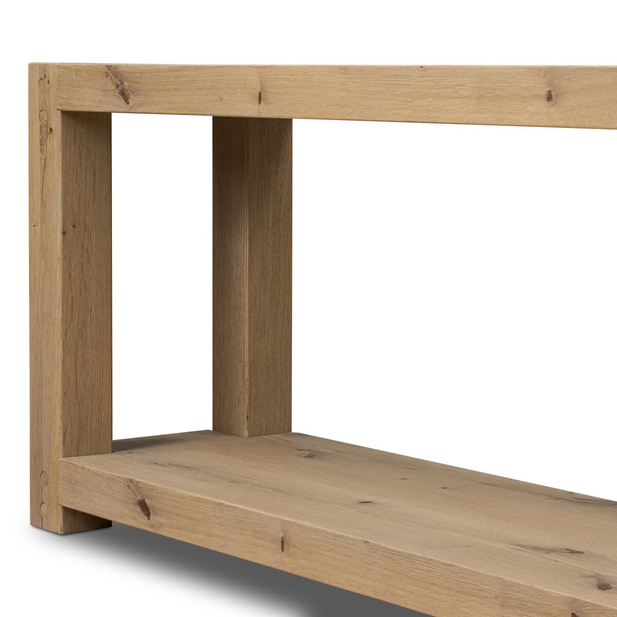 Close up of Four Hands Emmer Console Table in Aged Smoked Oak on a white background at Addison West