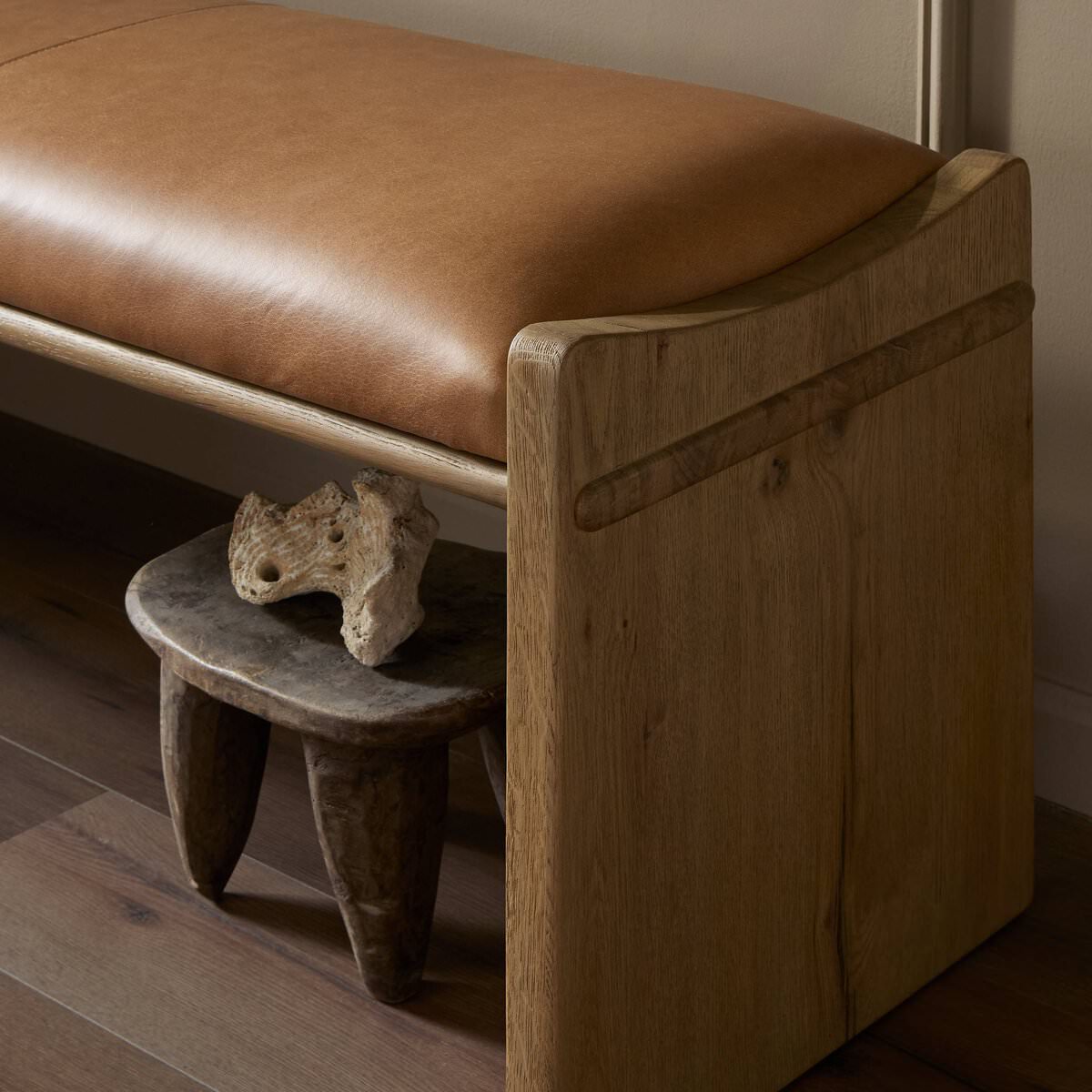 Close up of Four Hands Eros Accent Bench in Conroe Drift in an entryway at Addison West