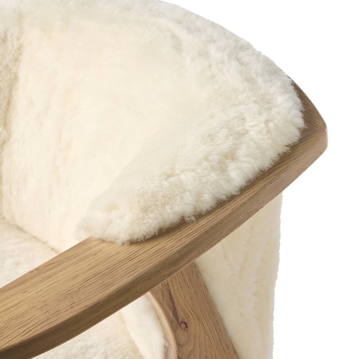 Close up of Four Hands Fabian Chair in Cream Shearling on a white background at Addison West