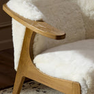 Close up of Four Hands Fabian Chair in Cream Shearling in a living room at Addison West