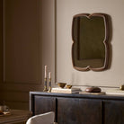 Four Hands Floret Mirror in Cocoa Oak in a dining room at Addison West