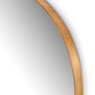Close up of Four Hands Georgina Wide Mirror in Polished Brass on a white background at Addison West