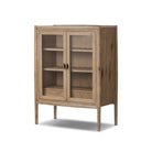 Four Hands Glenview Bar Cabinet in Weathered Oak on a white background at Addison West