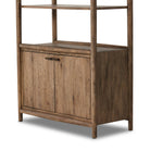 Close up of Four Hands Glenview Bookcase in Weathered Oak on a white background