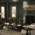 Four Hands Harlow Nesting End Tables in a dark neutral living room at Addison West