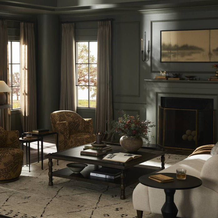 Four Hands Harlow Nesting End Tables in a dark neutral living room at Addison West