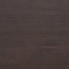 Close up of Four Hands Harper Oval Extension Dining Table 84-104" in Black Mango Veneer on a white background at Addison West