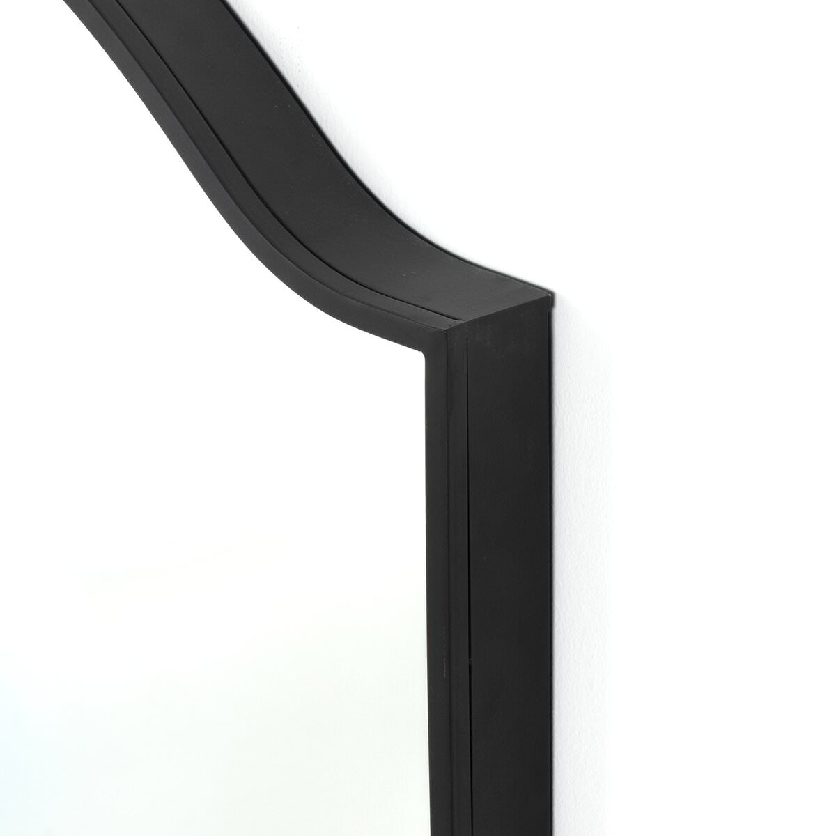 Close up of Four Hands Jacques Mirror in Gunmetal on a white background at Addison West