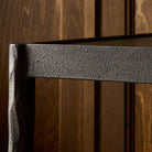 Four Hands Jade Console Table Textured Bronze in dining room at Addison West.