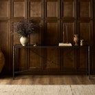 Four Hands Jade Console Table Textured Bronze in dining room at Addison West.