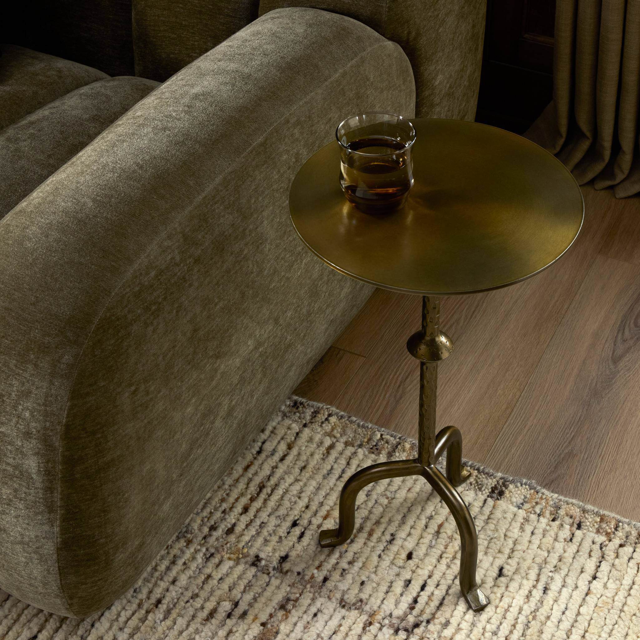 Four Hands Jocelyn End Table in Dark Brass in living room at Addison West.